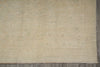 Load image into Gallery viewer, Beige woven rug on a wooden floor