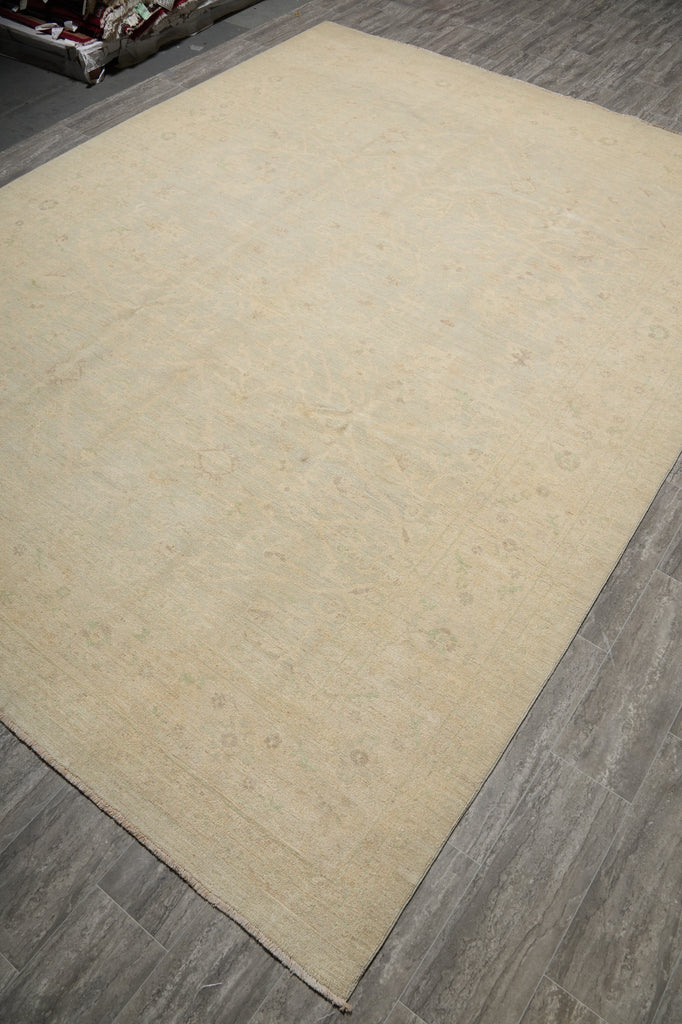 Beige rug on a wooden floor