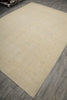 Load image into Gallery viewer, Beige rug on a wooden floor