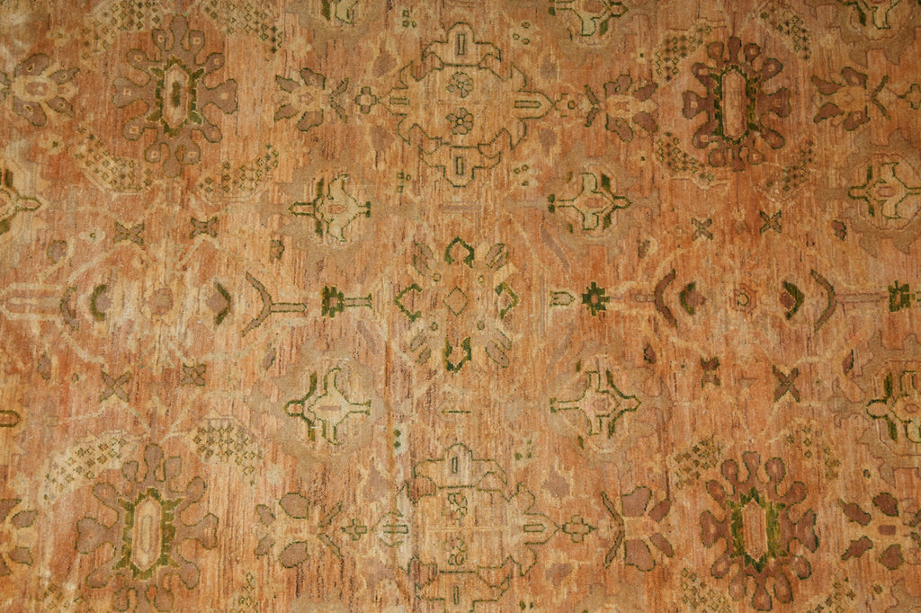 Patterned fabric with intricate design on a brown background