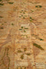 Load image into Gallery viewer, Close-up of a textured surface with brown and green patterns