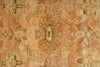 Load image into Gallery viewer, Close-up of a patterned rug with earthy tones