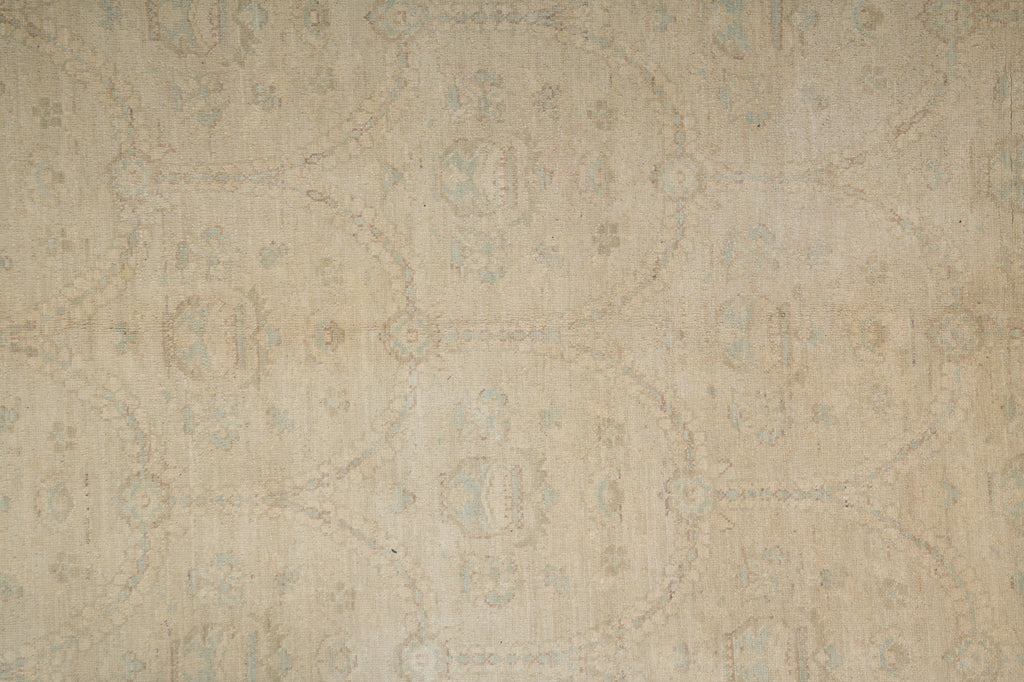 Textured beige wallpaper with intricate patterns