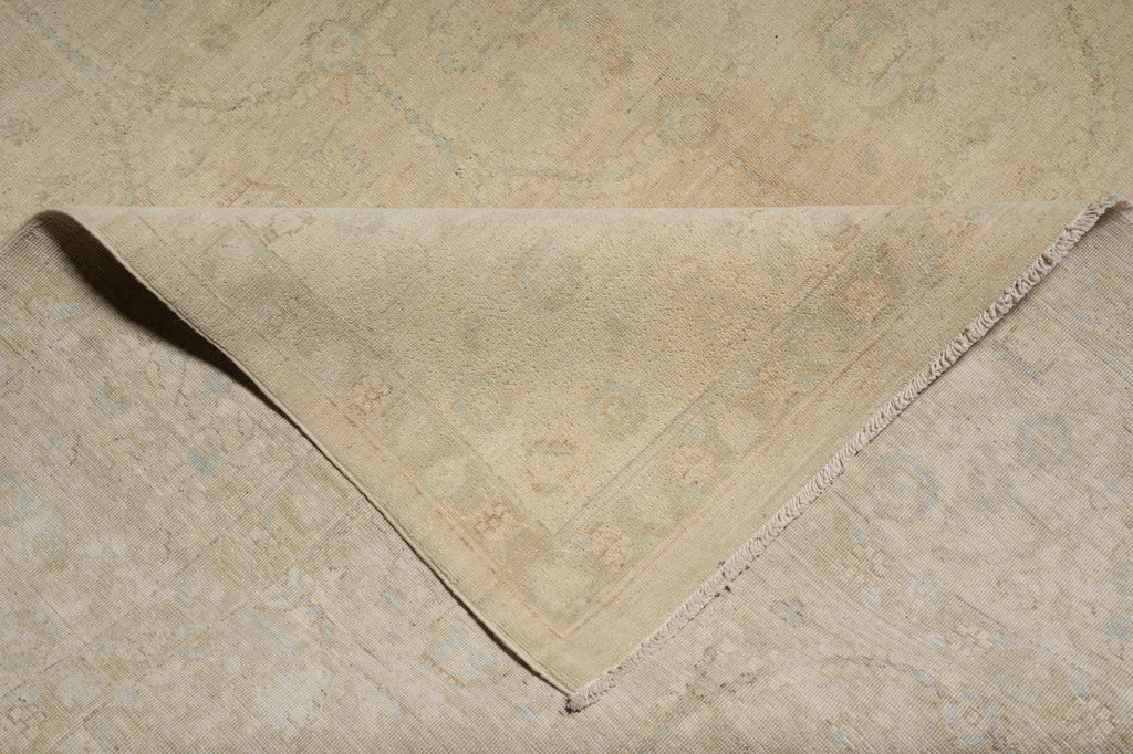 Beige patterned rug on a matching floor