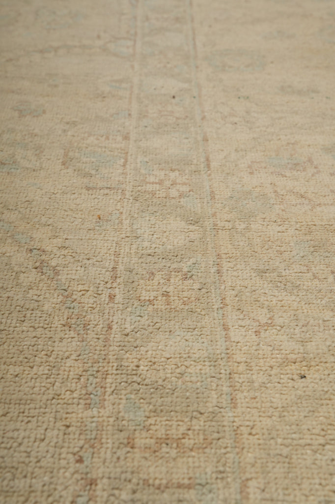 Textured beige surface with subtle patterns