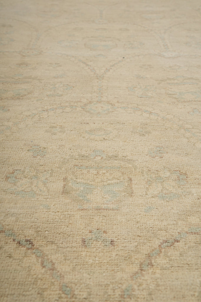 Textured beige fabric with subtle patterns