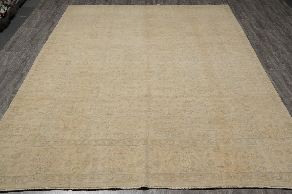 Beige area rug on a wooden floor