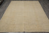 Load image into Gallery viewer, Beige area rug on a wooden floor