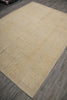 Load image into Gallery viewer, Beige patterned rug on a wooden floor