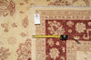 Load image into Gallery viewer, Measuring tape on a patterned rug with a visible brand label.