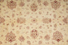 Load image into Gallery viewer, Patterned fabric with red floral and geometric designs on a beige background
