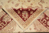 Load image into Gallery viewer, Close-up of a patterned rug with intricate designs.