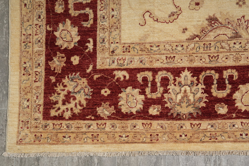Decorative rug with intricate patterns on a gray floor