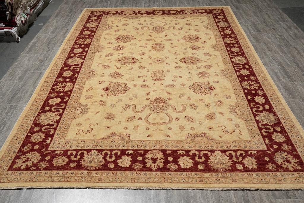 Decorative rug with intricate patterns on a gray floor