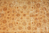 Load image into Gallery viewer, Patterned fabric with floral designs on a beige background