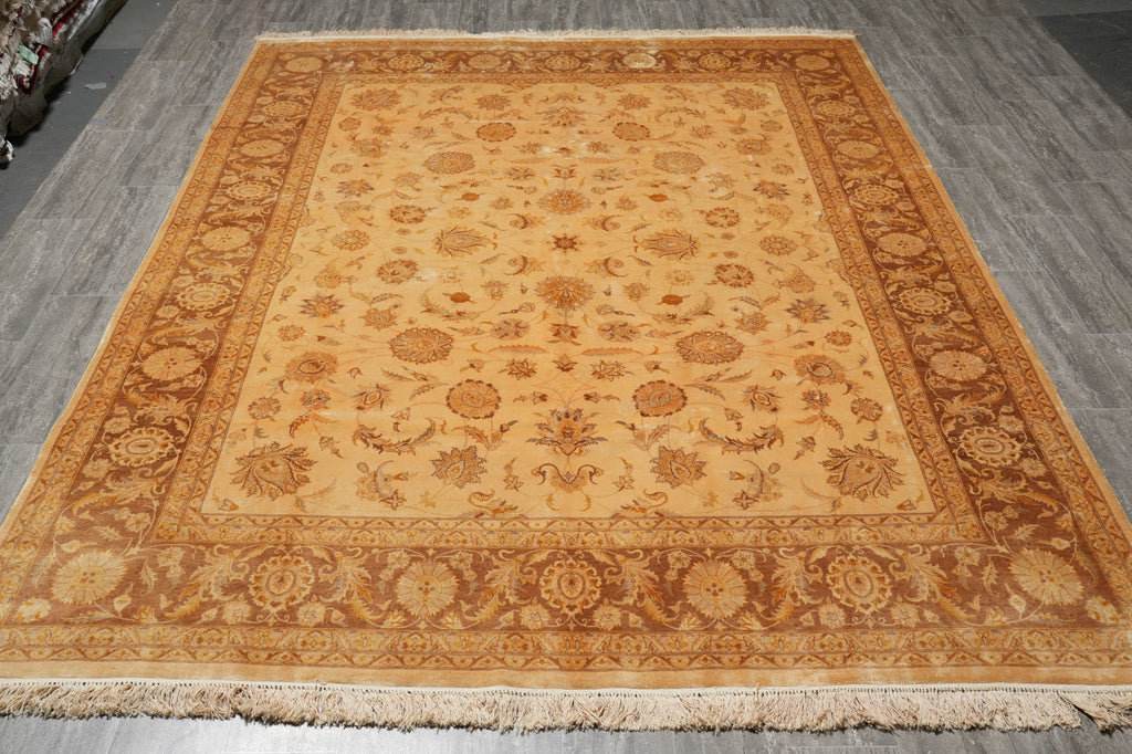 Decorative rug with intricate patterns on a wooden floor