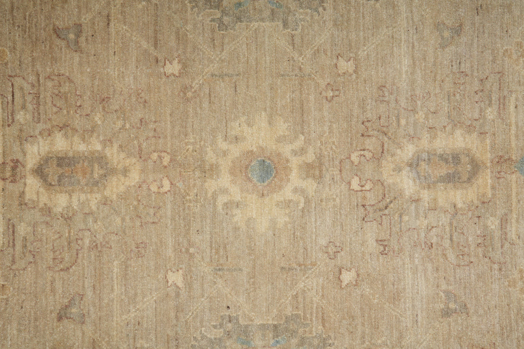 Patterned rug with beige and brown tones
