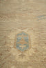 Load image into Gallery viewer, Textured beige fabric with a central blue pattern