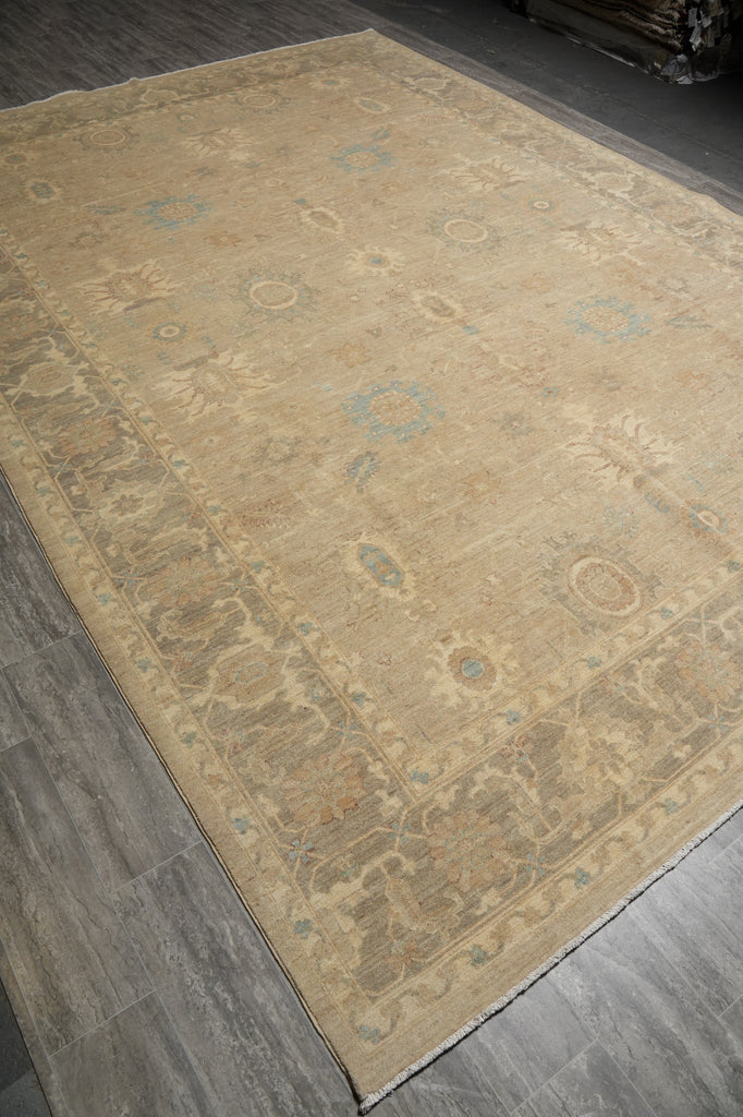 Decorative rug with intricate patterns on a wooden floor
