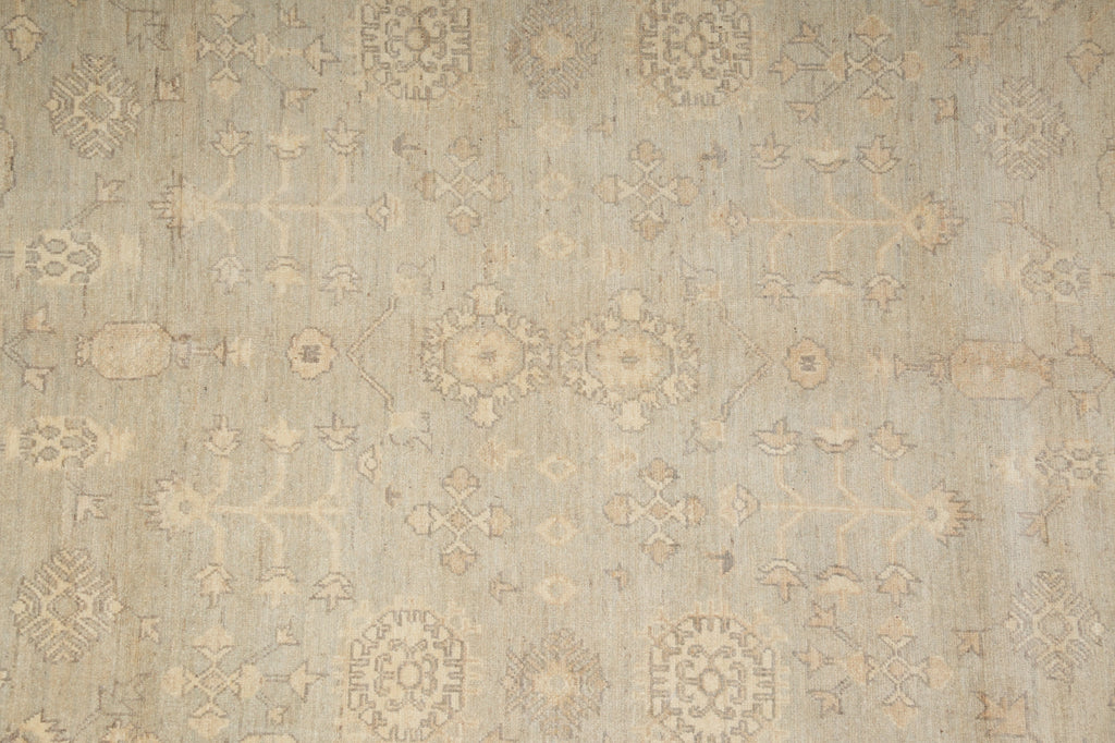 Patterned rug with geometric design on a beige background