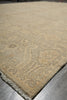Load image into Gallery viewer, Close-up of a patterned beige rug on a gray floor.
