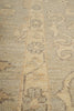 Load image into Gallery viewer, Close-up of a textured fabric with intricate patterns in beige and brown tones.