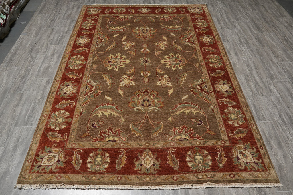 Decorative rug with intricate patterns on a wooden floor