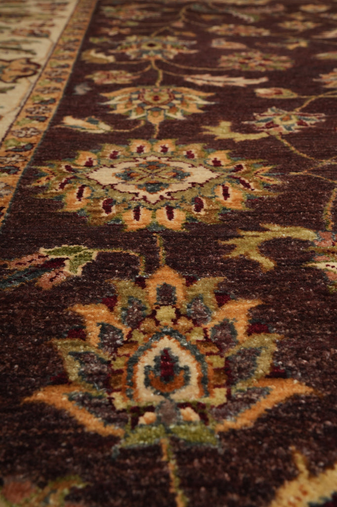 Close-up of a patterned rug with intricate designs.
