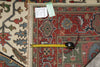 Load image into Gallery viewer, Decorative rug with a measuring tape for scale, showing intricate patterns and colors.