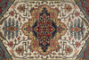 Load image into Gallery viewer, Close-up of a patterned rug with geometric design