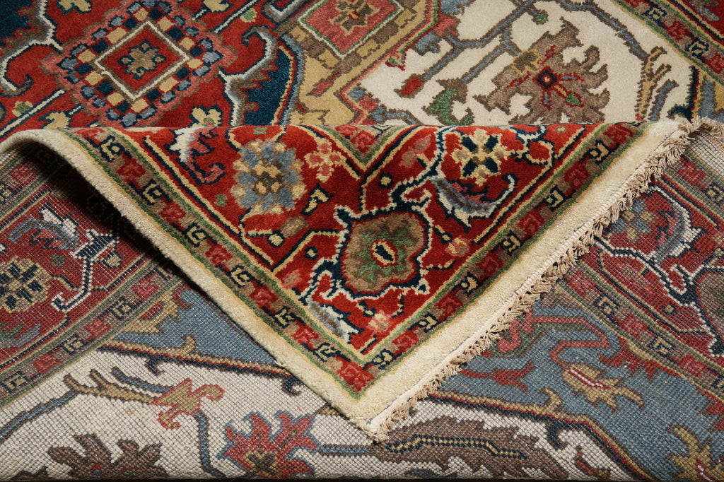 Close-up of a patterned rug with intricate designs.