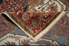 Load image into Gallery viewer, Close-up of a patterned rug with intricate designs.