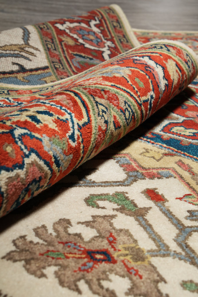 Close-up of a patterned rug with intricate designs.