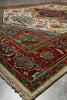 Load image into Gallery viewer, Close-up of a patterned rug with intricate designs on a metallic surface.