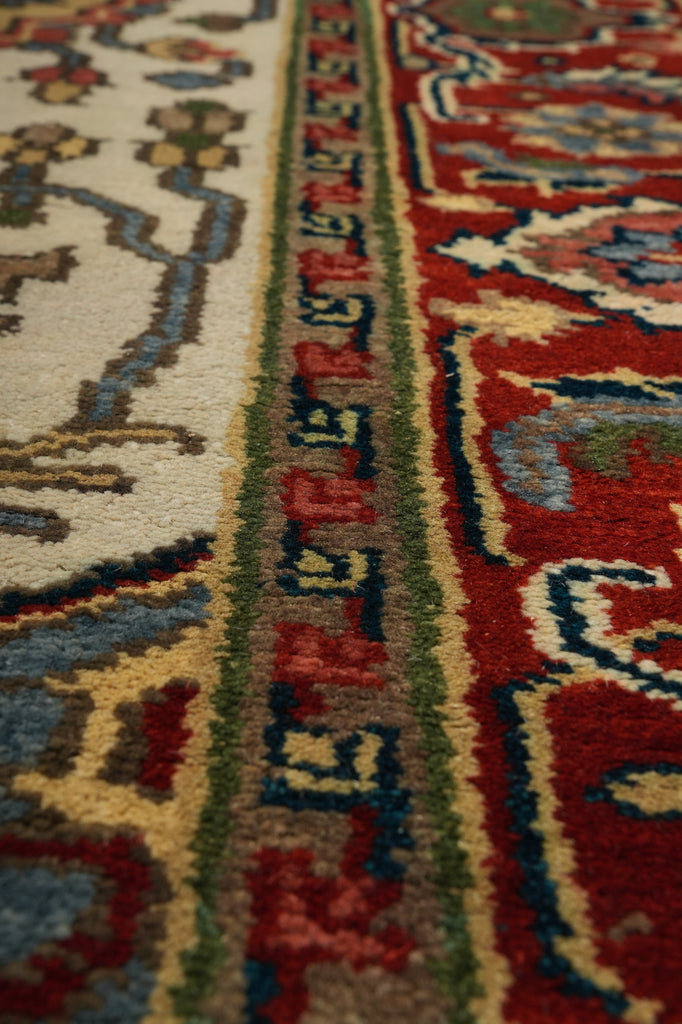 Close-up of a patterned rug with intricate designs and vibrant colors.