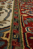 Load image into Gallery viewer, Close-up of a patterned rug with intricate designs and vibrant colors.