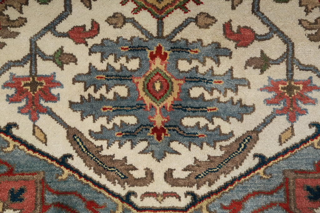 Close-up of an intricately designed rug with geometric patterns.