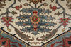 Load image into Gallery viewer, Close-up of an intricately designed rug with geometric patterns.