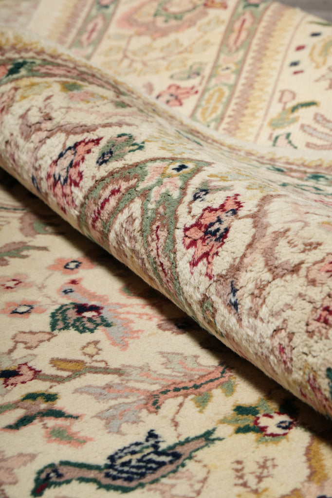 Close-up of a patterned rug with intricate designs.
