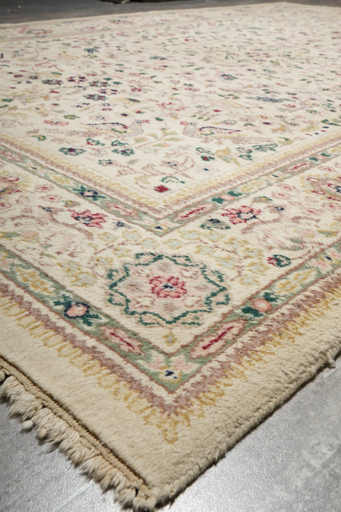 Decorative rug with intricate patterns on a neutral background