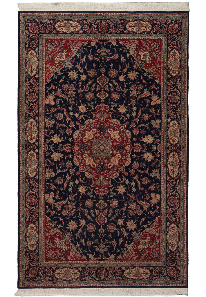 Decorative rug with intricate patterns on a plain background