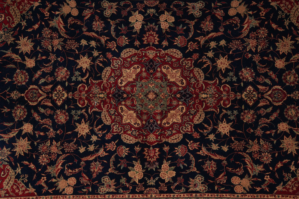 Close-up of a patterned rug with intricate designs.