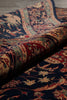 Load image into Gallery viewer, Close-up of a patterned rug with intricate designs.