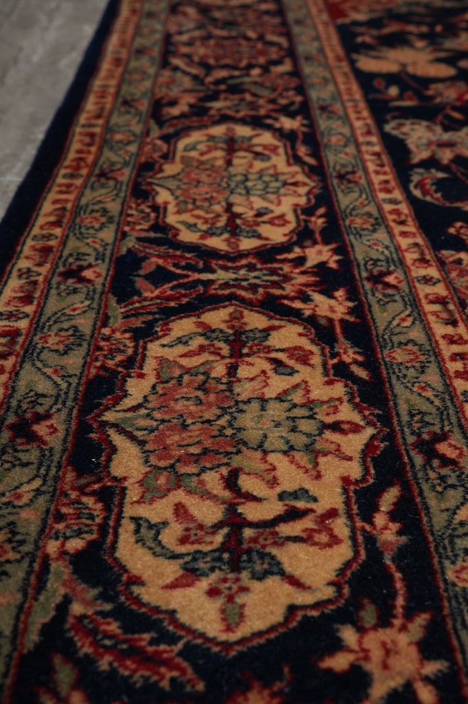 Close-up of an ornate rug with intricate patterns