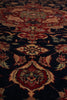 Load image into Gallery viewer, Close-up of a patterned rug with intricate designs.