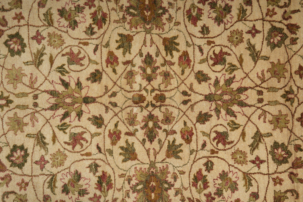 Close-up of a patterned rug with intricate designs in various colors.