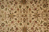 Load image into Gallery viewer, Close-up of a patterned rug with intricate designs in various colors.