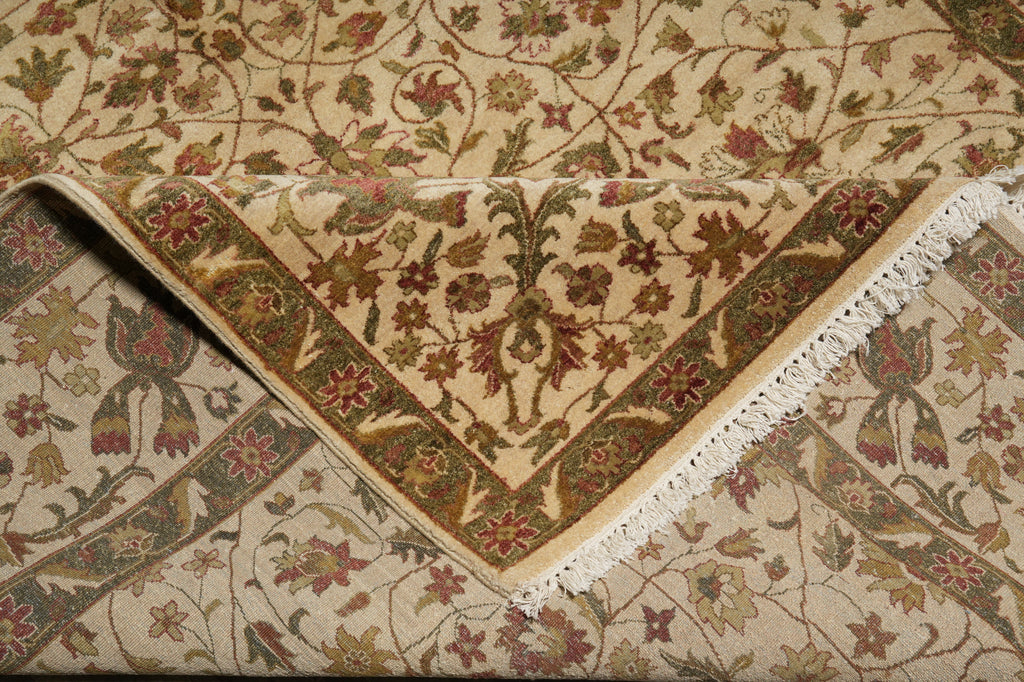Close-up of a patterned rug with intricate designs and colors.