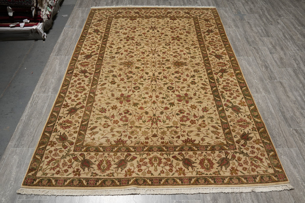 Decorative rug with intricate patterns on a wooden floor