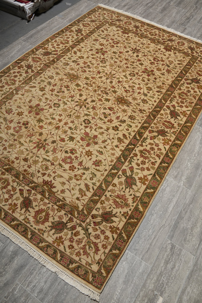 Decorative rug with floral patterns on a wooden floor